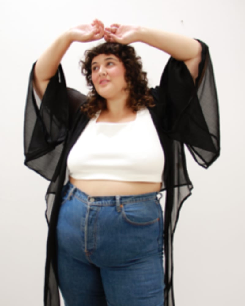 Front of a model wearing a size L Julie Kimono in Black Shimmer by Lovefool. | dia_product_style_image_id:249634